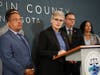 Hennepin County Attorney Mary Moriarty speaks during a news conference at the Hennepin County Government Center in Minneapolis, Minn., on Monday, May 18, 2026. Attorney General Keith Ellison stands at left.