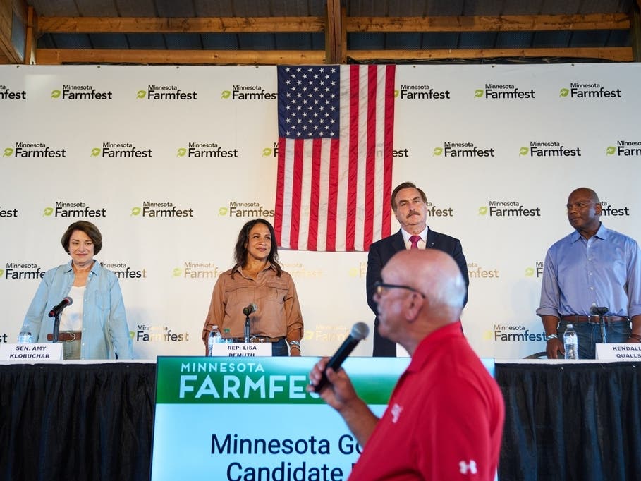 Candidates for Minnesota governor, from left, Sen. Amy Klobuchar, D-Minn., Minnesota House Speaker Lisa Demuth, Mike Lindell and Kendall Qualls participate in a forum at Farmfest, Wednesday, Aug. 5, 2026, in Morgan, Minn.