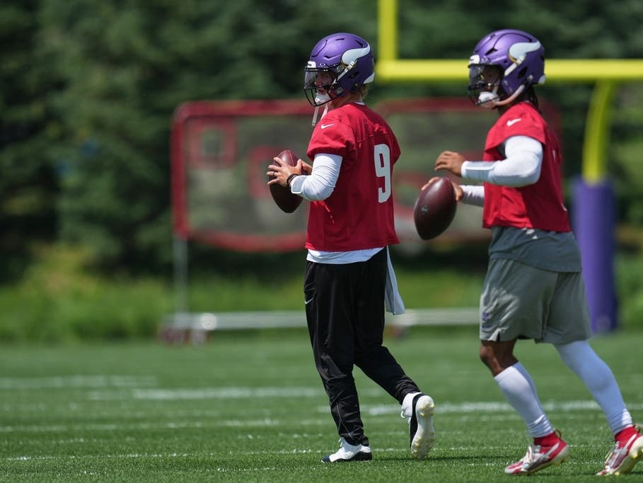 Minnesota Vikings quarterbacks J.J. McCarthy (9) and Kyler Murray (1) take part in drills during an NFL football practice Tuesday, June 9, 2026 in Eagan, Minn. 