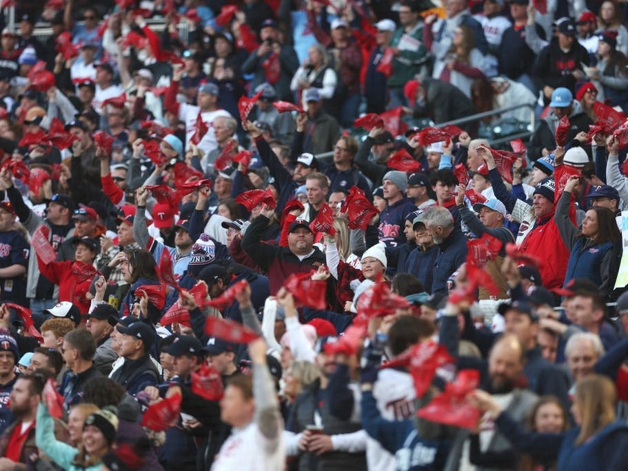 Minnesota Twins fans cheer during player introduction before Game 4 of a baseball AL Division Series against the Houston Astros, Wednesday, Oct. 11, 2023, in Minneapolis.