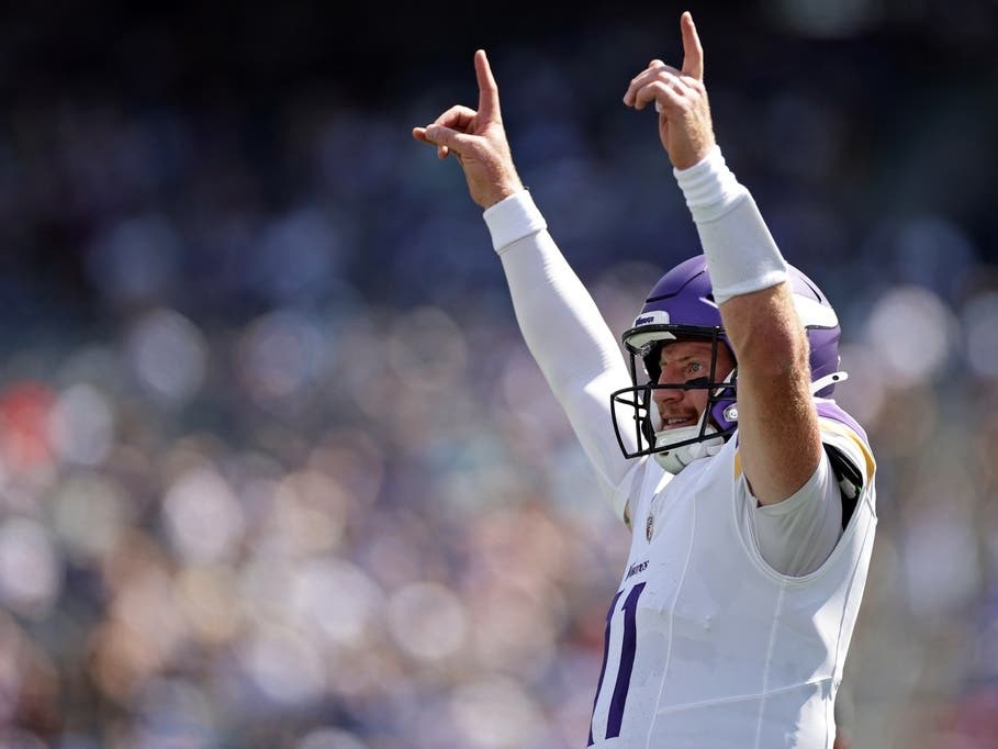 Minnesota Vikings quarterback Carson Wentz (11) reacts to a touchdown during an NFL preseason football game against the New York Giants in East Rutherford, N.J., Saturday, Aug. 15, 2026. 