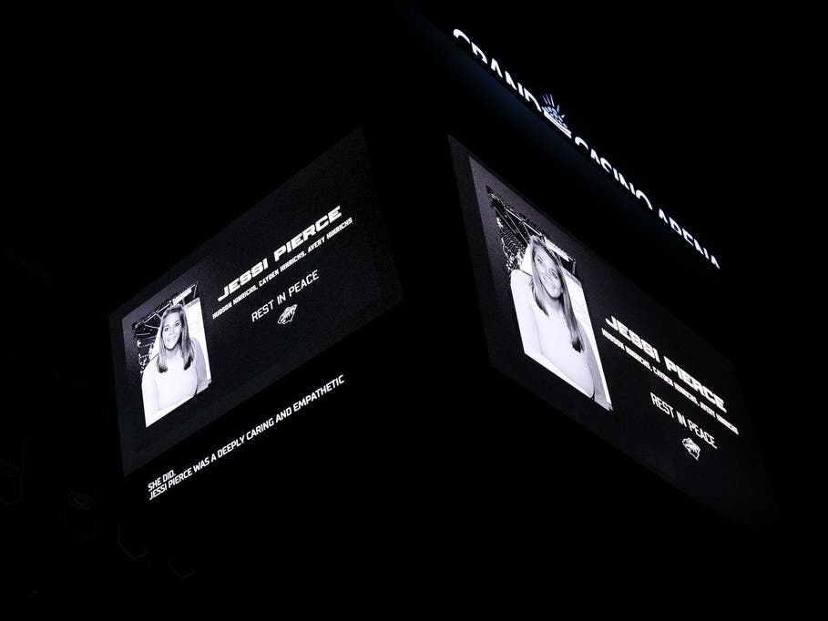 A moment of silence was held for NHL.com reporter Jessi Pierce and her kids Hudson, Cayden and Avery Hinrichs prior to an NHL hockey game between the Minnesota Wild and the Vancouver Canucks, Thursday, April 2, 2026, in St. Paul, Minn. 
