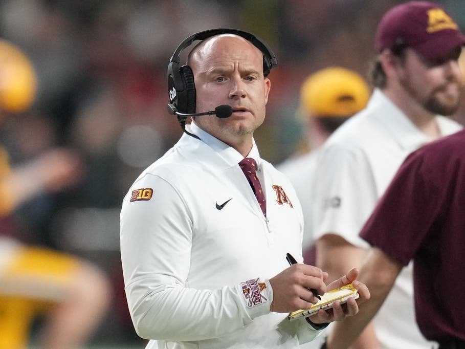 FILE - Minnesota head coach P.J. Fleck looks on in the first half during the Rate Bowl NCAA college football game against New Mexico on Dec. 26, 2025, in Phoenix.
