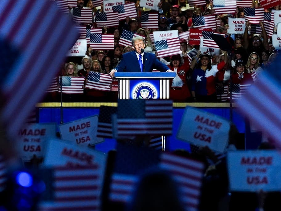 People wave American flags as President Donald Trump speaks at the Republican convention, Wednesday, Sept. 9, 2026, in Dallas.