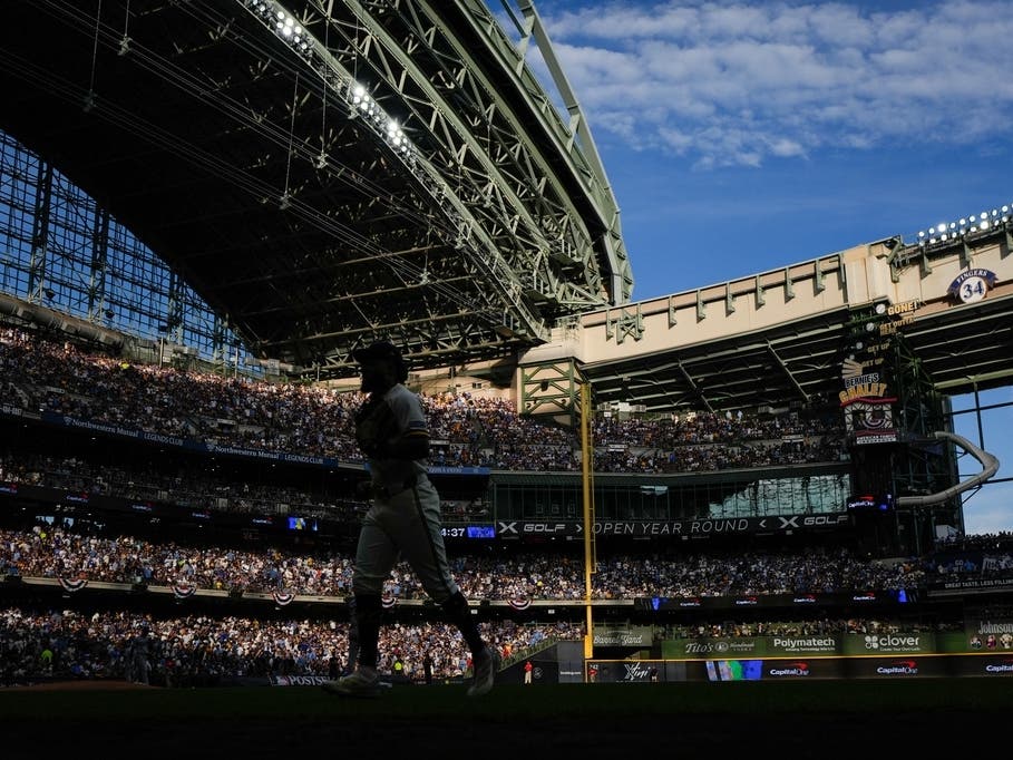 Milwaukee Brewers left fielder Jackson Chourio runs to the dugout during the second inning of Game 2 of baseball's National League Championship Series between the Milwaukee Brewers and the Los Angeles Dodgers, Monday, Oct. 12, 2026, in Milwaukee.