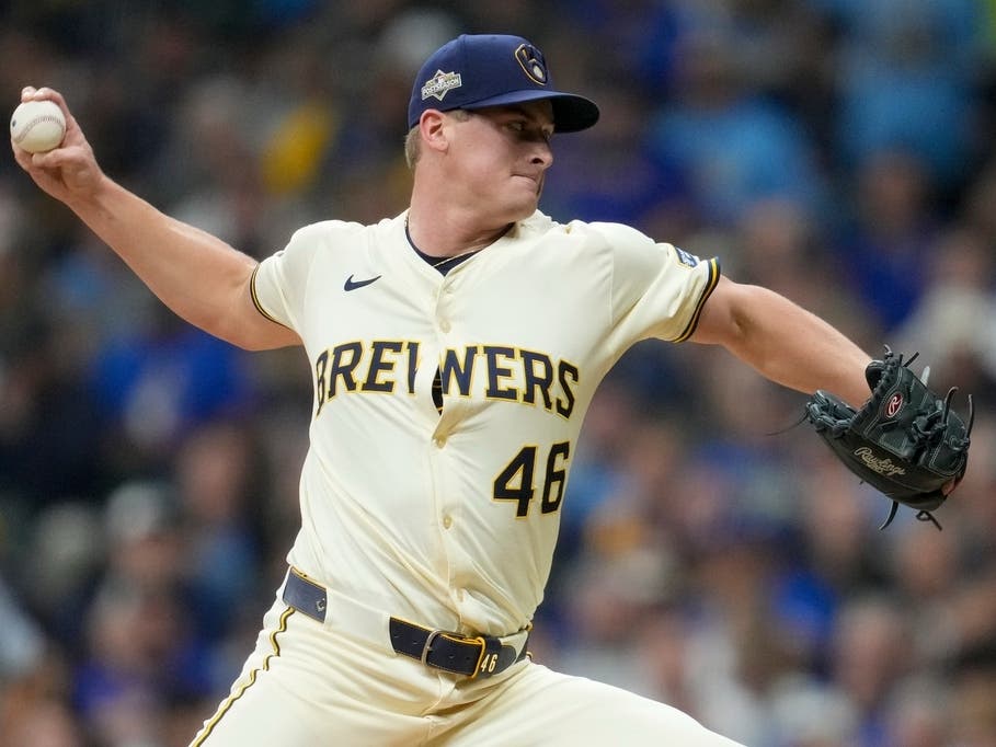 FILE - Milwaukee Brewers pitcher Quinn Priester throws against the Los Angeles Dodgers during the second inning in Game 1 of baseball's National League Championship Series, Oct. 13, 2025, in Milwaukee.