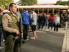 Students evacuate their campus after a gunman opened fire at Saugus High School on Thursday, Nov. 14, 2019, in Santa Clarita, Calif.