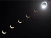 The progression of a total solar eclipse is seen in a multiple exposure photograph taken in 5-minute intervals, with the moon passing in front of the sun above Siem Reap in northwestern Cambodia, 225 kilometers (140 miles) from Phnom Penh in 1995.