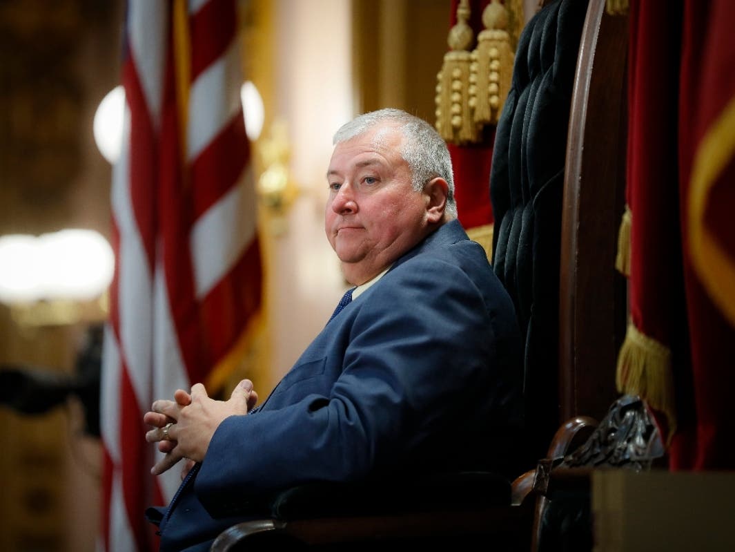 Ohio State Rep. Larry Householder stands at the head of a legislative session as speaker of the House. FBI agents were at the farm of Householder on Tuesday morning, hours ahead of a planned announcement of a $60 million bribery investigation.