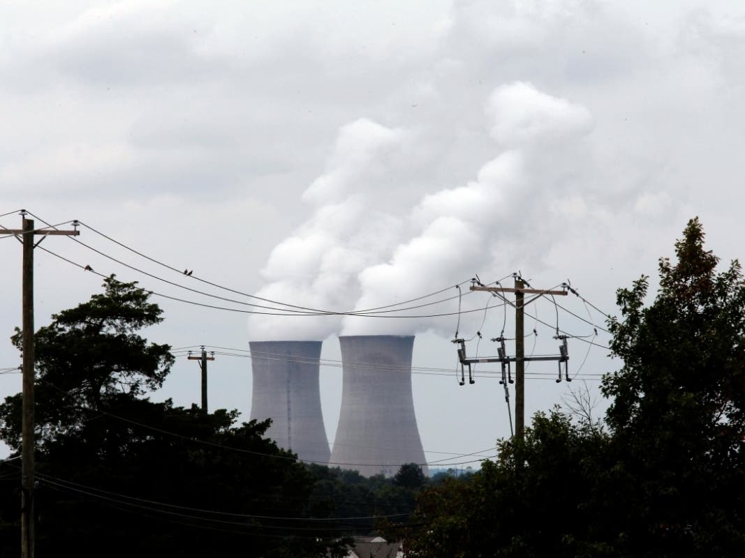 Clouds of steam rise from the cooing towers of the Limerick Generating Station nuclear power plant as seen, Friday, Sept. 2, 2011 from Media, Pa.