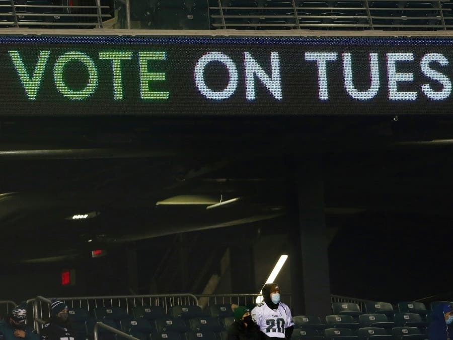 Vote on Tuesday is run on the LED ribbon board during an NFL football game between the Dallas Cowboys and Philadelphia Eagles, Sunday, Nov. 1, 2020, in Philadelphia.