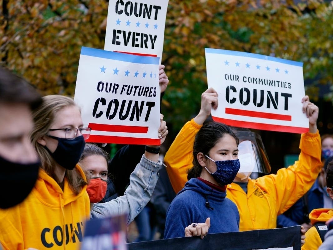 Demonstrators urge that all votes be counted outside the Pennsylvania Convention Center, Wednesday, Nov. 4, 2020, in Philadelphia.