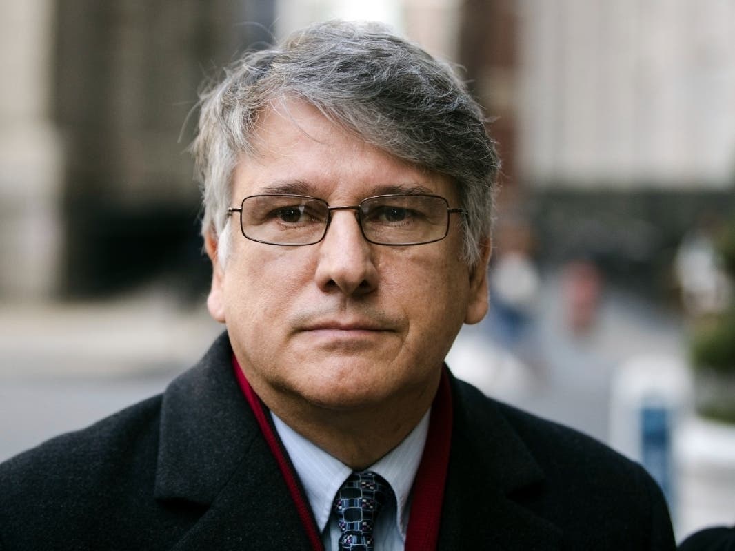 Dr. Ricardo Cruciani leaves the center for criminal justice, Nov. 21, 2017, in Philadelphia, after pleading guilty to misdemeanor charges that he groped women at a clinic.