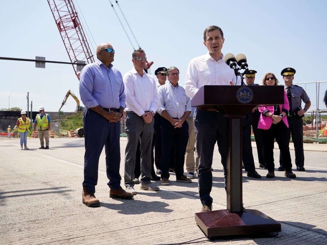 Transportation Secretary Pete Buttigieg speaks with members of the media at scene of a collapsed elevated section of Interstate 95, in Philadelphia, Tuesday, June 13, 2023.
