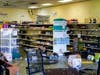 Shown is the aftermath of a ransacked liquor store in Philadelphia, Wednesday, Sept. 27, 2023. Police say groups of teenagers swarmed into stores across Philadelphia in an apparently coordinated effort, stuffed bags with merchandise and fled.