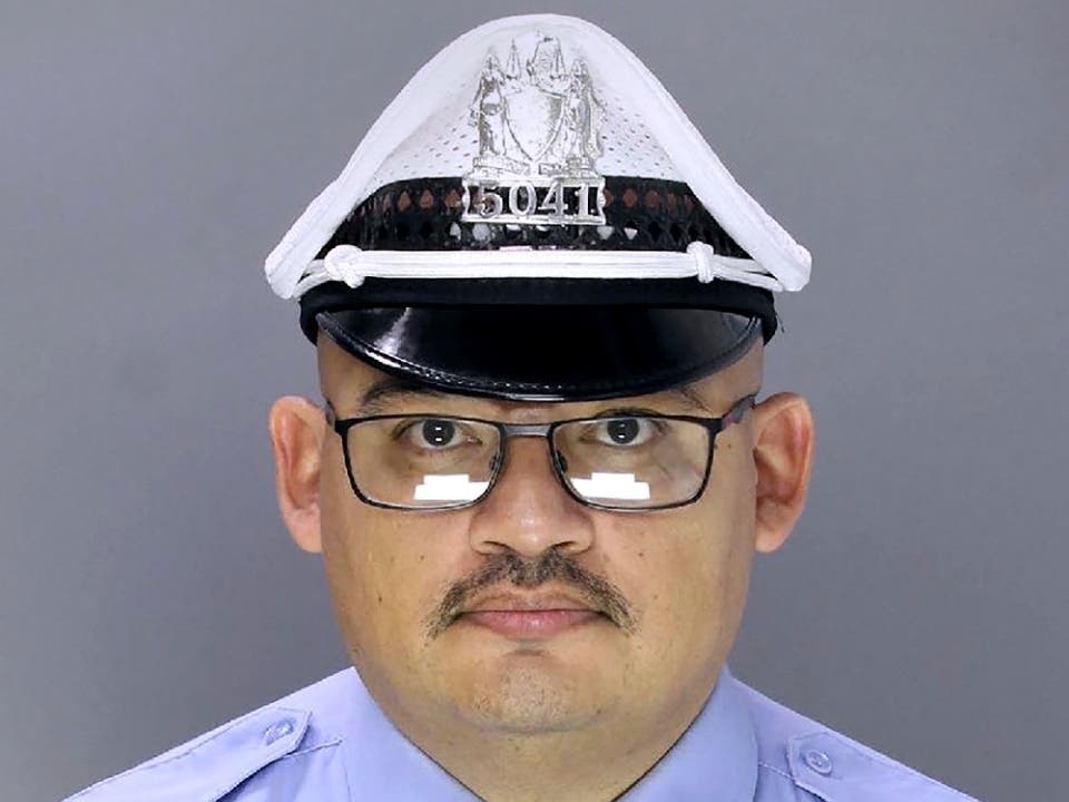 In this undated photo released by the Philadelphia Police Department Office of Public Affairs shows Officer Richard Mendez.