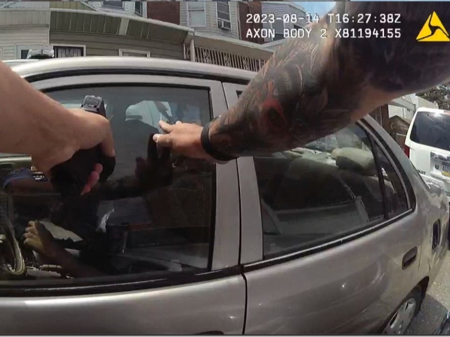 This screen grab taken from the body cam video shows Philadelphia Police Officer Mark Dial with his weapon drawn at Eddie Irizarry on Aug. 14, 2023 in Philadelphia.