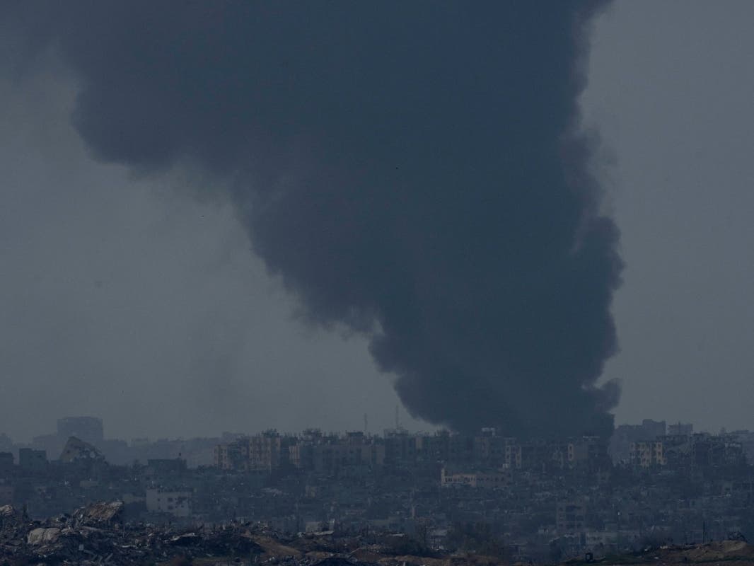 Smoke rises following an Israeli bombardment in the Gaza Strip, as seen from southern Israel, Friday, Dec. 8, 2023.