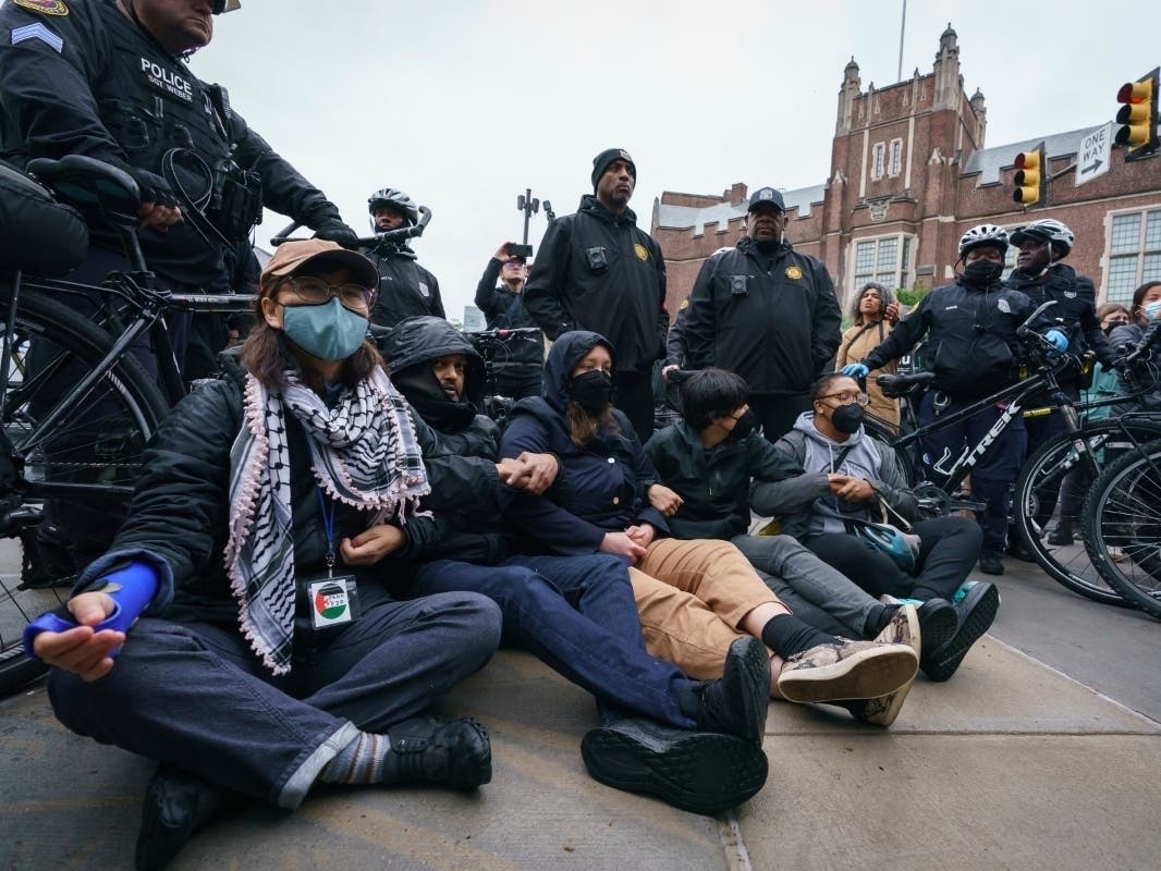 Police arrive to remove protesters on the University of Pennsylvania campus, in Philadelphia, on Friday, May 10, 2024.