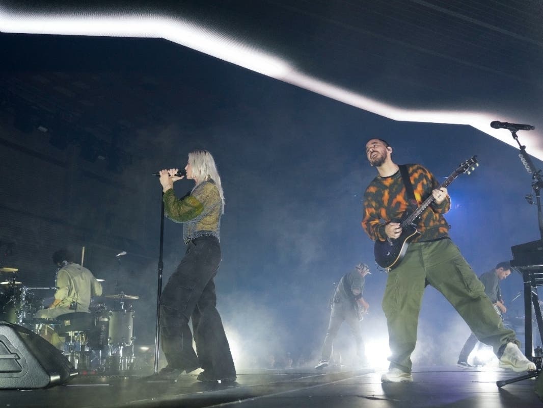 Colin Brittain, from left, Emily Armstrong, Phoenix, Mike Shinoda, and Alex Feder (filling in for guitarist Brad Delson) of Linkin Park perform Thursday, Sept. 5, 2024, in Los Angeles. 