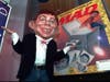 Mad Magazine mascot Alfred E. Neuman shows off the debut cover of the publication's new look in 1997.