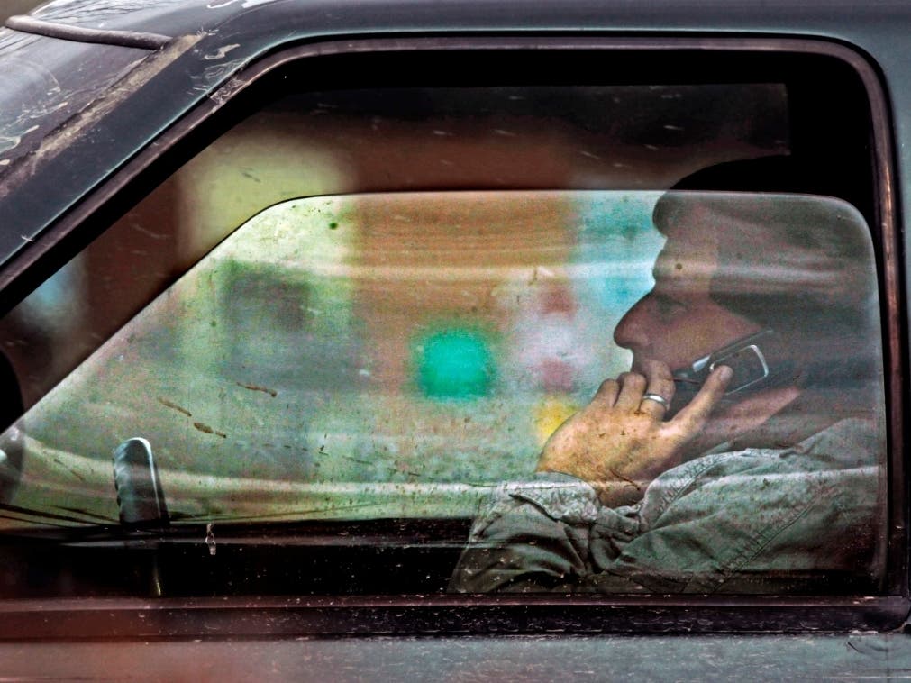 A first-time offender would get a $100 fine for a first offense under Massachusetts' new distracted-driving law. 