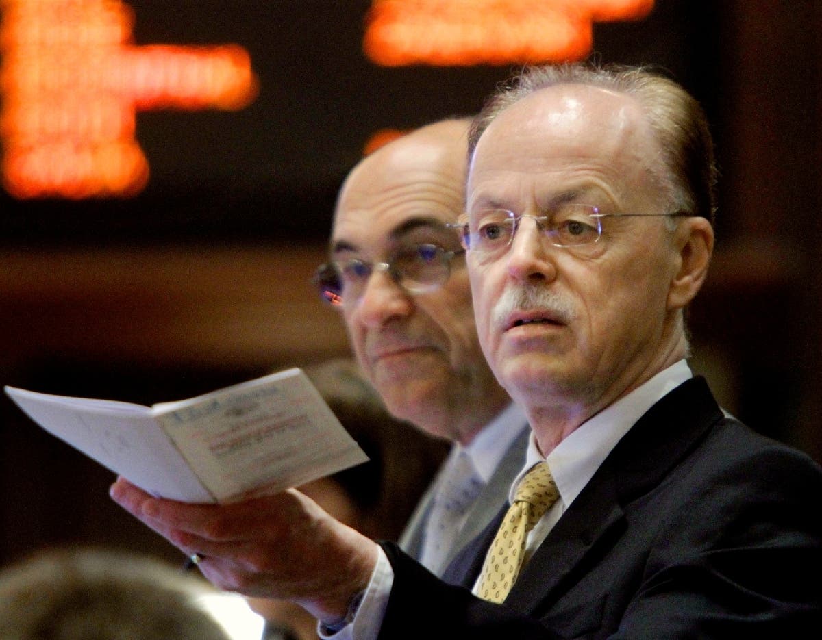 Timothy Mapes, former chief of staff for Illinois House Speaker Michael Madigan, stands in front of former Rep. Lou Lang during a debate at the Capitol in Springfield in a 2011 file photo.