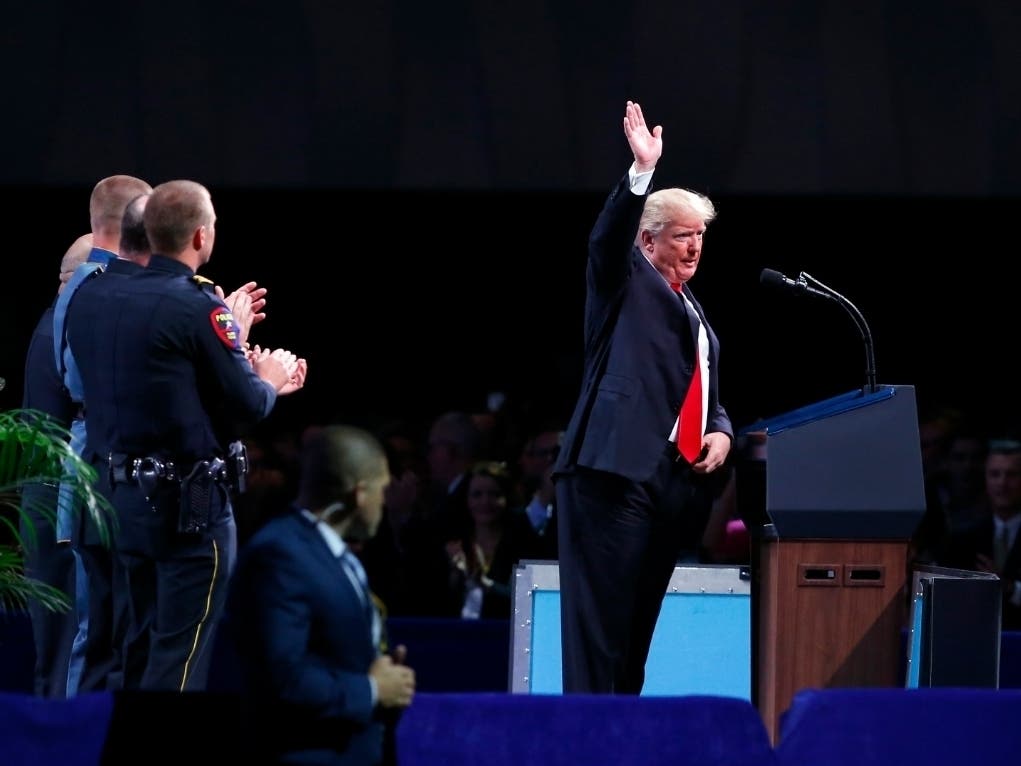 President Donald Trump waves after speaking at the International Association of Chiefs of Police annual conference in Orlando, Florida in 2018..