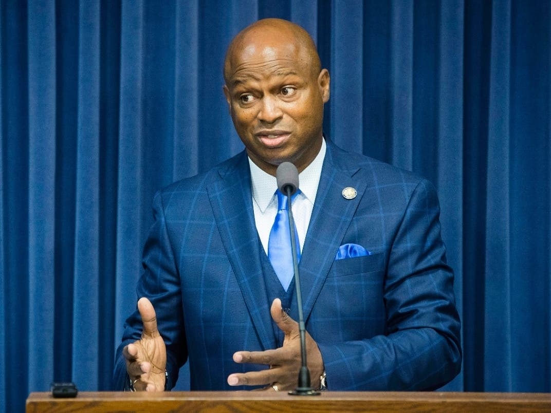 Rep. Emanuel "Chris" Welch (D-Hillside) speaks to reporters following a meeting of a special investigating committee looking into House Speaker Michael Madigan's role in a bribery scandal. Welch blocked moves to compel Madigan to testify in the hearing.