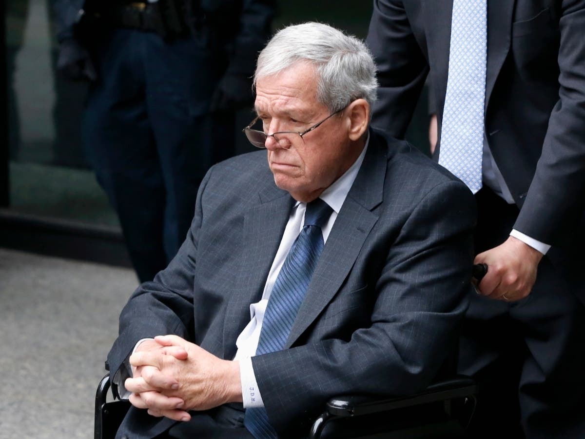 Former U.S. House Speaker Dennis Hastert leaves federal court following his April 2016 sentencing. Attorneys for Hastert and a man who accused him of child sexual abuse said Wednesday they have reached a tentative out-of-court settlement in a civil case.