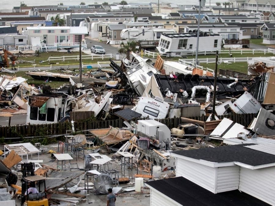 Mobile homes are upended and debris is strewn about at the Holiday Travel Park, in Emerald Isle, North Carolina, after a possible tornado generated by Hurricane Dorian struck the area.