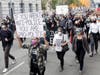 People march toward City Hall during a protest over the Memorial Day death of George Floyd, a handcuffed black man in police custody in Minneapolis, in San Francisco, Saturday, May 30, 2020.