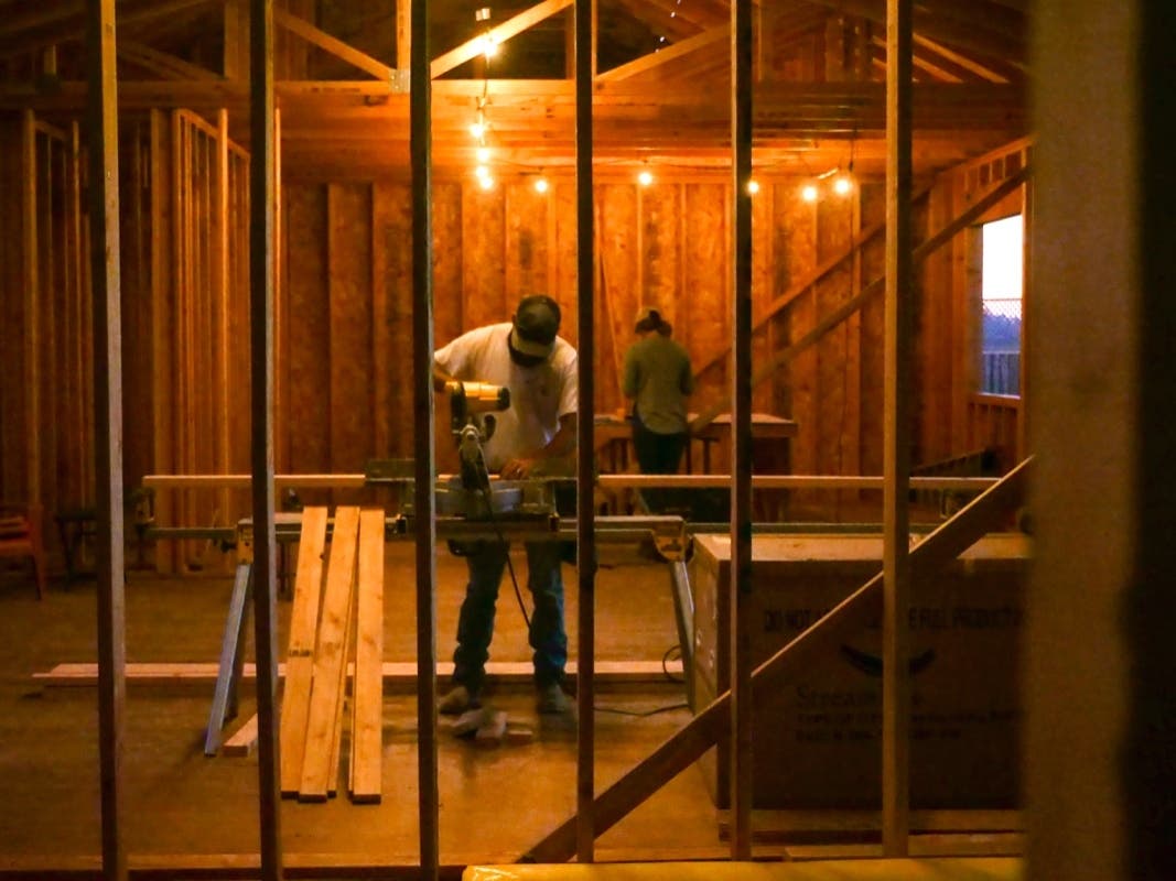 Bobbie Chandler, and his wife, Jenna, work in the home they are building in Santa Rosa, Calif. Chandler's parents' home of 20 years and thousands of other structures were destroyed by the Tubbs Fire and other wine country wildfires of 2017.
