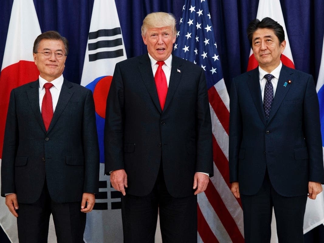  In August 2019, Trump angered some Asian American voters after the New York Post reported that he mocked the accents of South Korean President Moon Jae-in, left, and Japanese Prime Minister Shinzo Abe, right, at a fundraiser in the Hamptons.