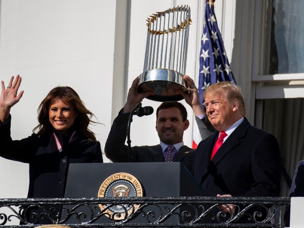 First Lady Melania Trump, Washington Nationals infielder Ryan Zimmerman and President Donald Trump arrive for an event to honor the 2019 World Series Champion Washington Nationals, on the South Lawn of the White House, Monday.