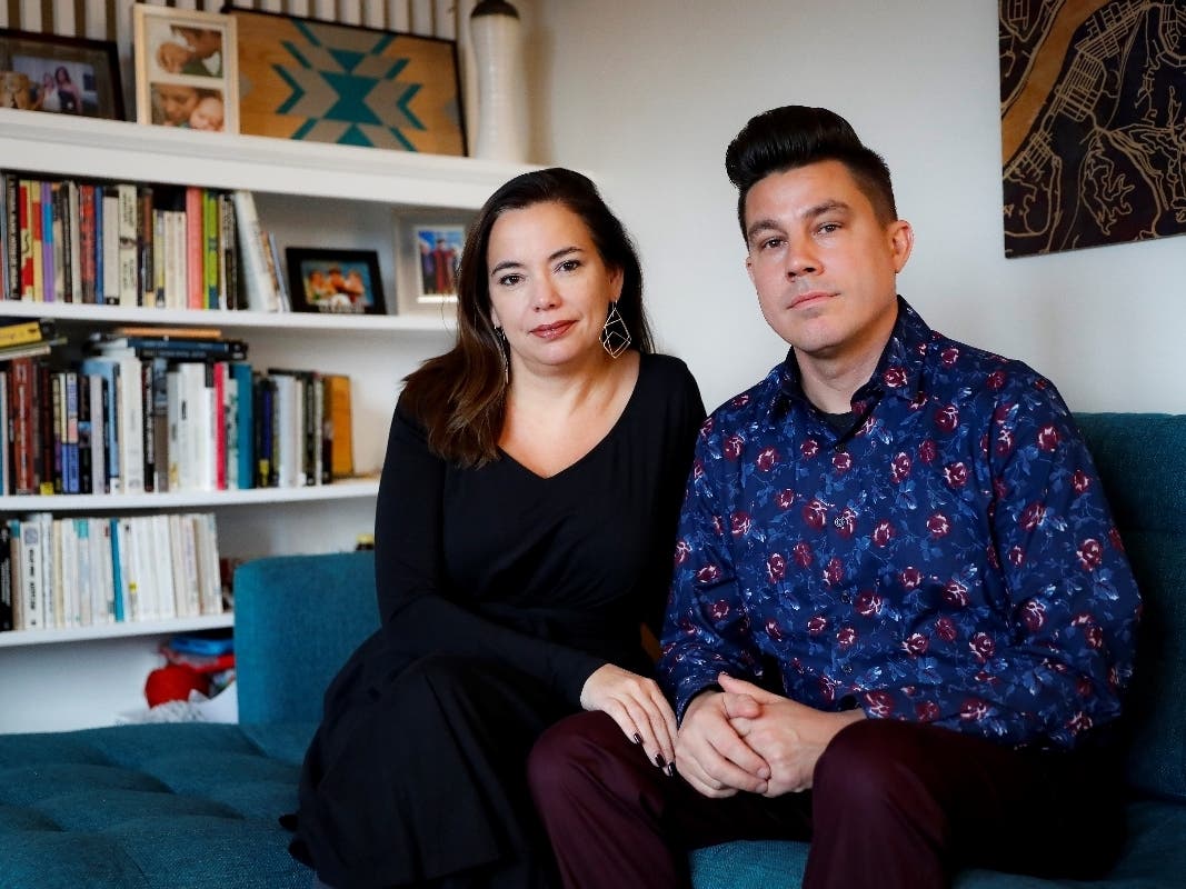 Bryan Wright and Farrah Jacquez are shown at their home Tuesday in Cincinnati. Wright says "impeachment will definitely come up" as a divisive topic at his extended family's Thanksgiving meal.