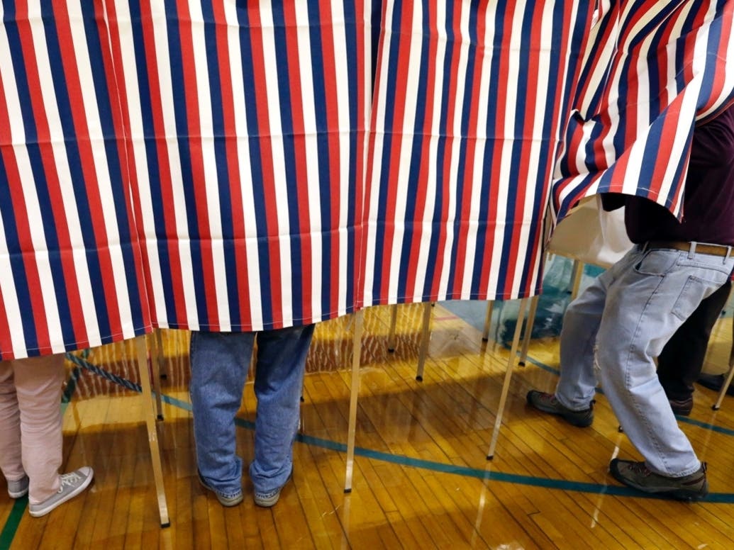 The state law was passed by a Republican-majority Legislature after President Donald Trump alleged widespread voter fraud in New Hampshire, claiming it led to his loss to Hillary Clinton in the state.