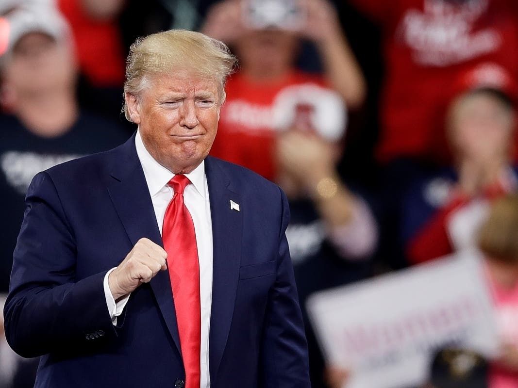 President Donald Trump gestures as he arrives at a campaign rally Tuesday in Hershey, Pennsylvania.