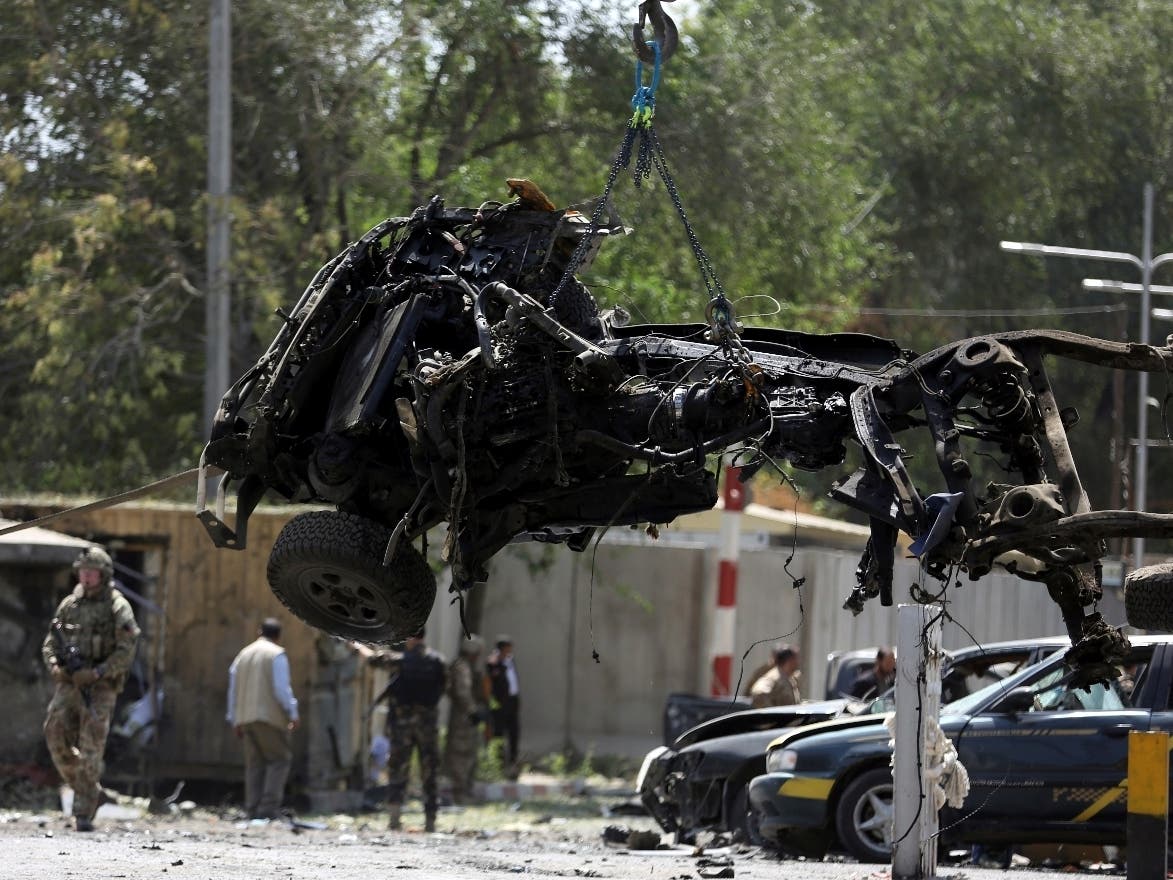 Resolute Support forces remove a destroyed vehicle  Sept. 5 after a car bomb explosion in Kabul, Afghanistan. U.S. military officials said an American solider was killed Monday in Afghanistan.