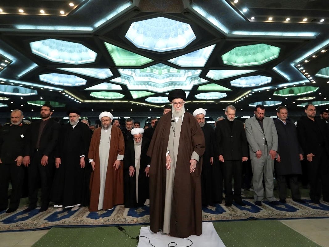 Supreme Leader Ayatollah Ali Khamenei (center) leads the Friday prayers at Imam Khomeini Grand Mosque in Tehran, Iran.