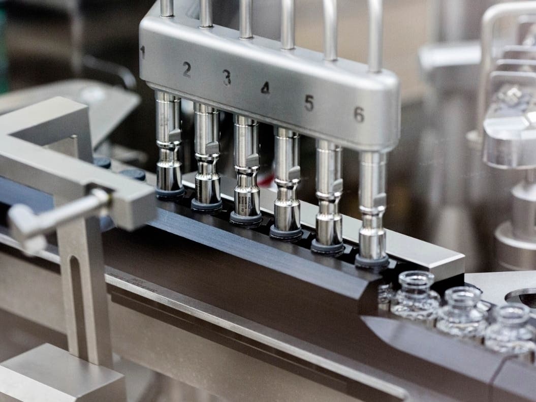 Given through an IV, remdesivir is designed to interfere with an enzyme that reproduces viral genetic material.