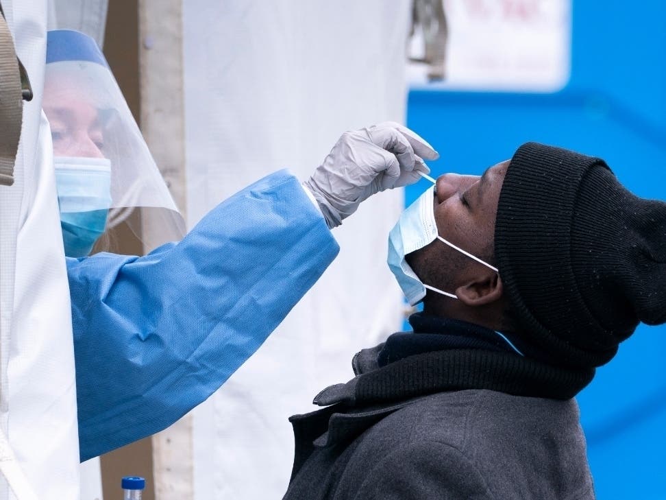 A man is tested at a temporary COVID-19 test clinic during the coronavirus pandemic.