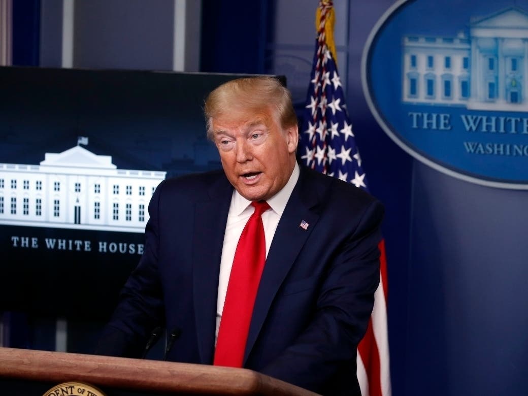 President Donald Trump speaks with reporters about the coronavirus in the James Brady Briefing Room of the White House Friday.