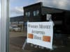 A sign on a business in Tenino, Wash. says they will be accepting wooden money