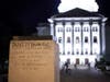 The assault came amid a night of violence Tuesday that included the toppling of two statues outside the Capitol and an attack on a state senator. 