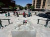 The assault came amid a night of violence Tuesday that included the toppling of two statues outside the Capitol and an attack on a state senator. 