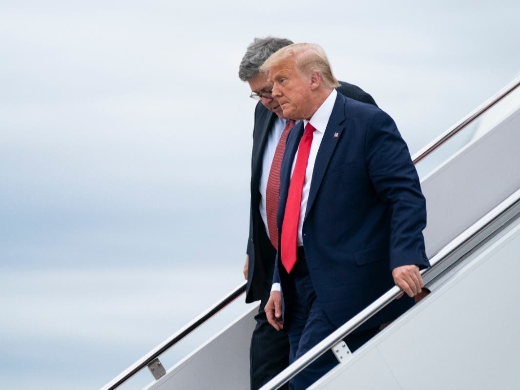 The Centers for Disease Control and Prevention's sweeping directive halting evictions stems from an executive order President Donald Trump, shown here Tuesday with Attorney General William Barr, asking federal officials to temporarily halt evictions.