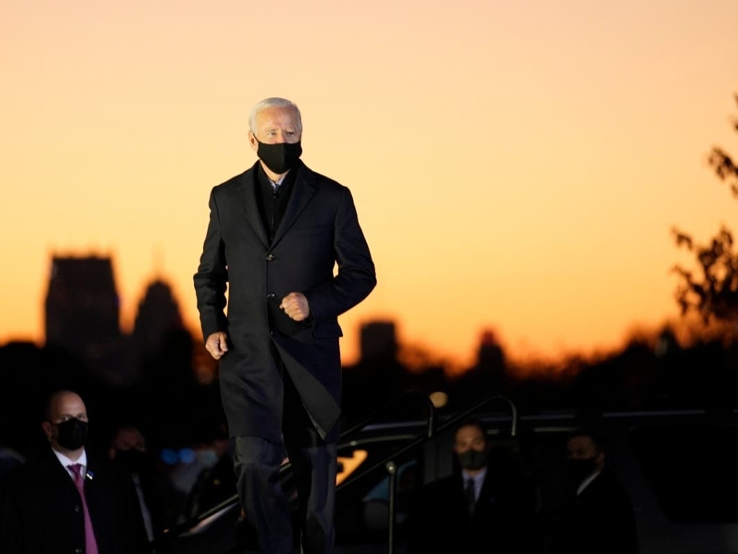 Democratic presidential candidate former Vice President Joe Biden arrives to speak at a rally at Belle Isle Casino in Detroit, Michigan, Saturday. Former President Barack Obama also attended the rally.