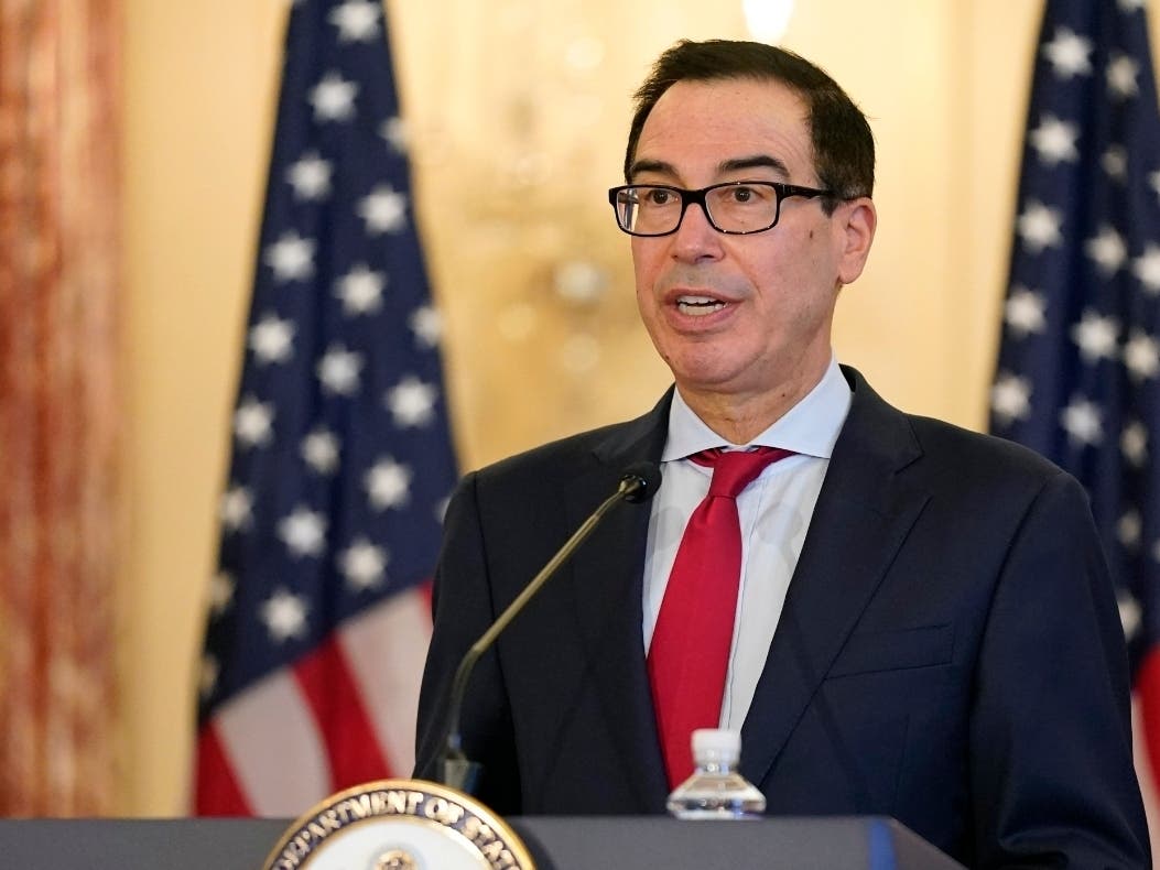 Treasury Secretary Steven Mnuchin, pictured above at a September news conference, said Thursday he won't extend several emergency loan programs set up with the Federal Reserve to support the economy in the midst of the coronavirus pandemic.