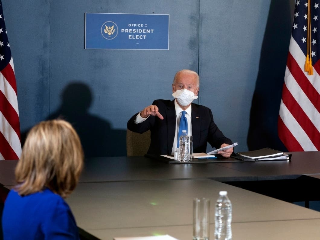 President-elect Joe Biden speaks during a meeting with Vice President-elect Kamala Harris, Senate Minority Leader Chuck Schumer of New York, and House Speaker Nancy Pelosi of California, left, Friday in Wilmington, Delaware. 